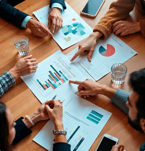 Team reviewing product quality reports and release metrics together