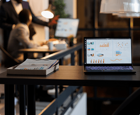 Analytics dashboard on a laptop in a working office